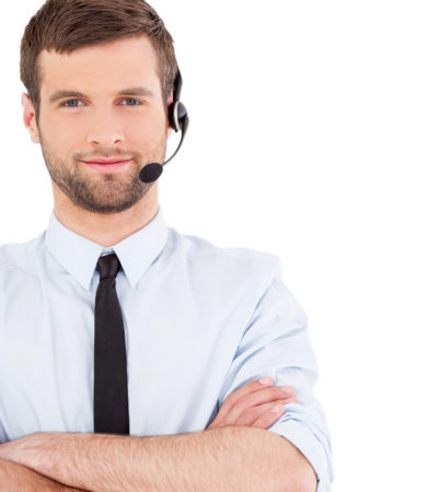Male operator. Male operator. Handsome young man in formalwear and headset looking at camera and smiling while standing isolated on white background